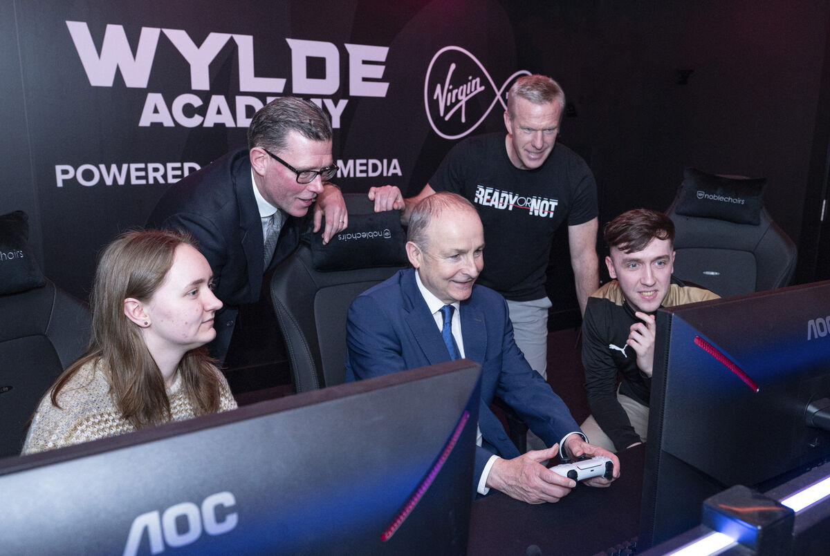 Gamer Karina Shastak, Steve Daly of the National Esports Centre and Philip Nathan of Void Interactive with Taoiseach Micheál Martin and Wylde Esports player Ciarán Walsh at the official opening of the Esports Centre in Cork in March. Picture: Gerard McCarthy 