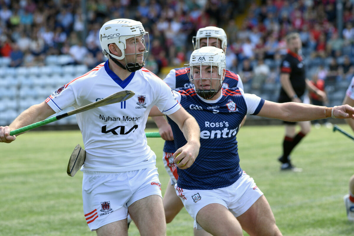 Courcey's Richard Sweetnam gets the attention of Aaron Spriggs at Páirc Uí Rinn. Picture: Dan Linehan