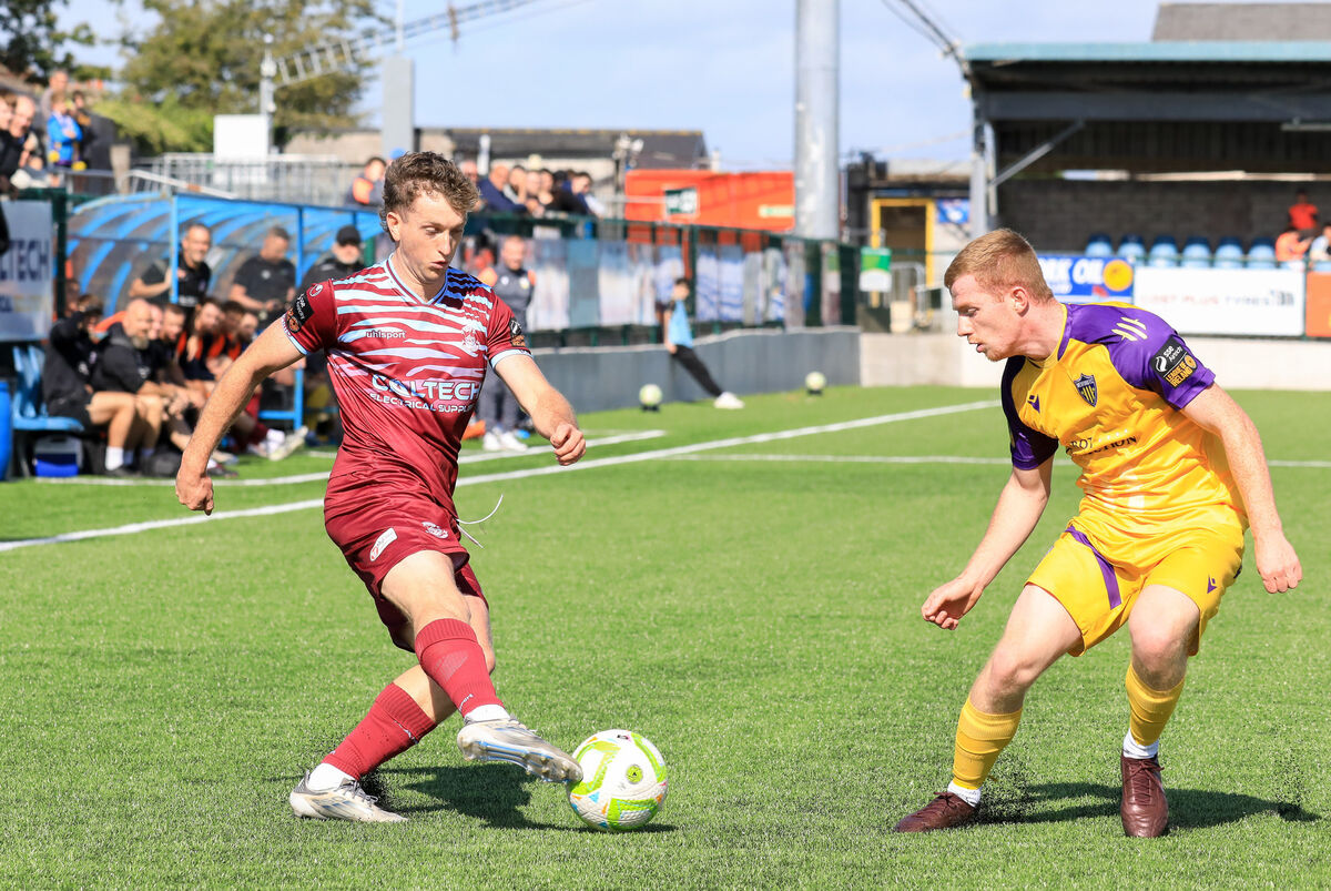 Cobh's Cian Bargary tries to go around Wexford defender Cian Browne. Pic: David Creedon.