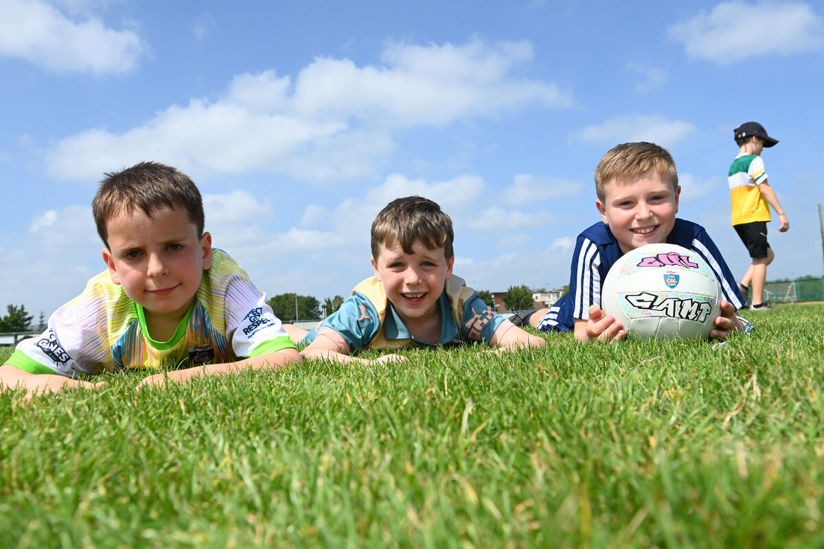  Jacob Gosnell, Aodhán Gallagher and Aidan Byrne take a break from play at the Kellogg's Cúl Camp at St Michael's Gaelic Football Club, Mahon, Cork. Picture: Larry Cummins