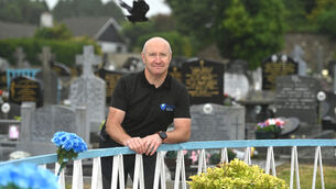 <p>Cemetery registrar Paul Flynn: 'A lot of visitors here carry on the way they always did.' Picture: Dan Linehan</p>