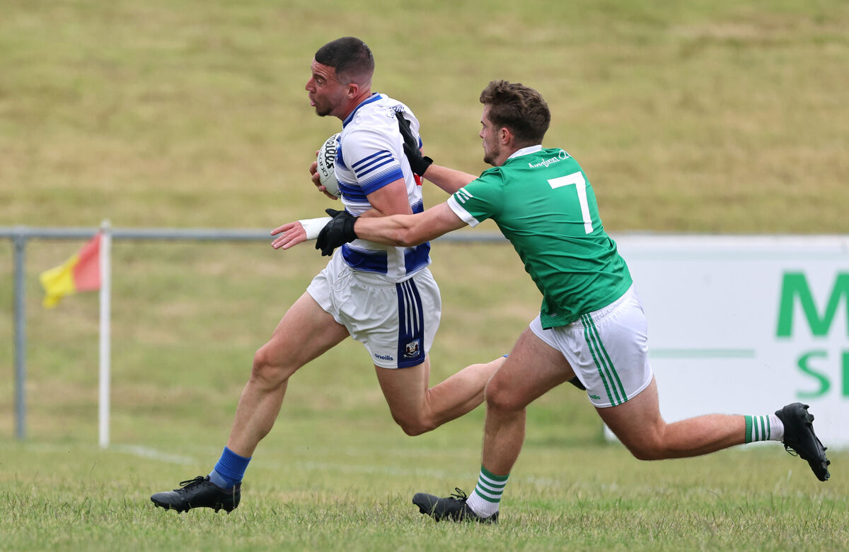 Ballyphehane's Troy O'Sullivan drives past Araglen's Sean Motherway in the McCarthy Insurance Group Confined Junior B Football Championship Final. Pic: Jim Coughlan. Ballyphehane's Troy O'Sullivan drives past Araglen's Sean Motherway in the McCarthy Insurance Group Confined Junior B Football Championship Final. Pic: Jim Coughlan.