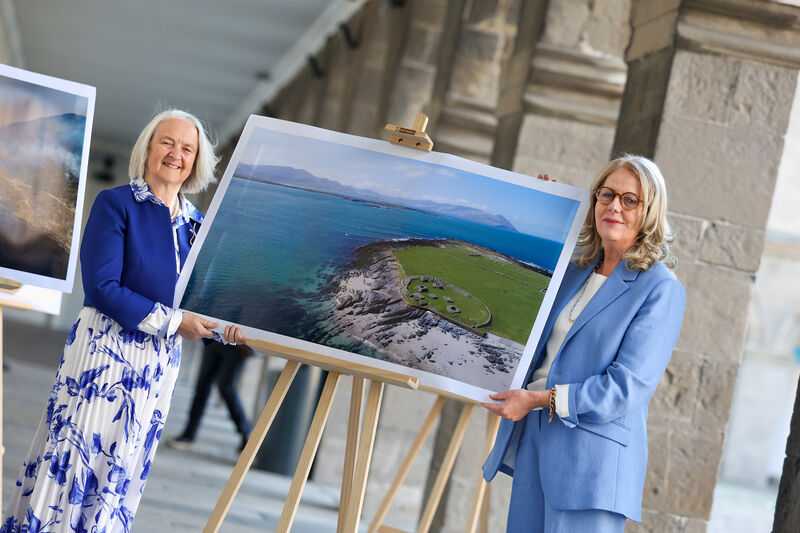 Heritage Council chairperson, Dr Martina Moloney, and chief executive, Virginia Teehan, at Heritage Horizons: Pathways to the Future, a national conference hosted by the Heritage Council at the Royal Hospital Kilmainham, Dublin in May, 2025. Dr Moloney and Ms Teehan are pictured alongside an image of the Illauntannig Monastic Site in Kerry, which is at significant risk from coastal erosion. Picture: Marc O'Sullivan Heritage Council chairperson, Dr Martina Moloney, and chief executive, Virginia Teehan, at Heritage Horizons: Pathways to the Future, a national conference hosted by the Heritage Council at the Royal Hospital Kilmainham, Dublin in May, 2025. Dr Moloney and Ms Teehan are pictured alongside an image of the Illauntannig Monastic Site in Kerry, which is at significant risk from coastal erosion. Picture: Marc O'Sullivan