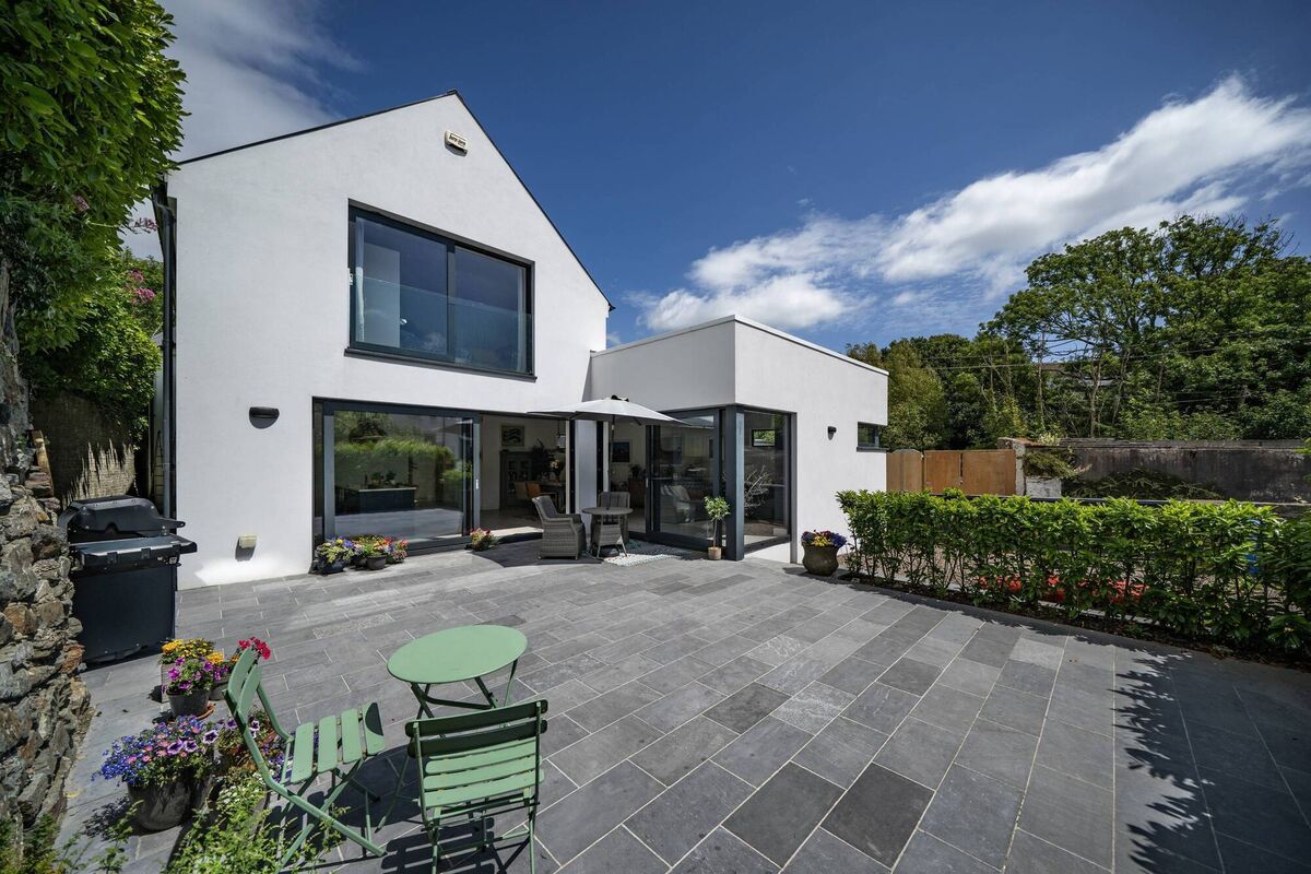 Private sun-trap courtyard with Kilkenny limestone paving Private sun-trap courtyard with Kilkenny limestone paving
