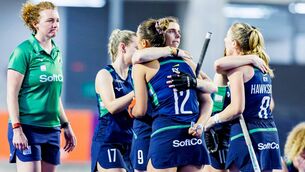 <p>Ireland’s Katie Mullan embraces teammate Elena Neill. Pic: WORLDSPORTPICS RODRIGO JARAMILLO</p>