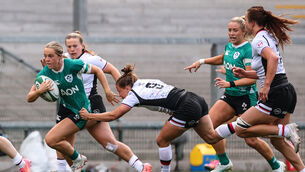 <p>Ireland's Aoibheann Reilly makes a break past Justine Pelletier. Pic: INPHO/Ben Brady</p>
