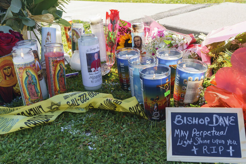 Candles and messages near Bishop David O'Connell's residence in Hacienda Heights, California, after his death in 2023. Picture: AP/Damian Dovarganes