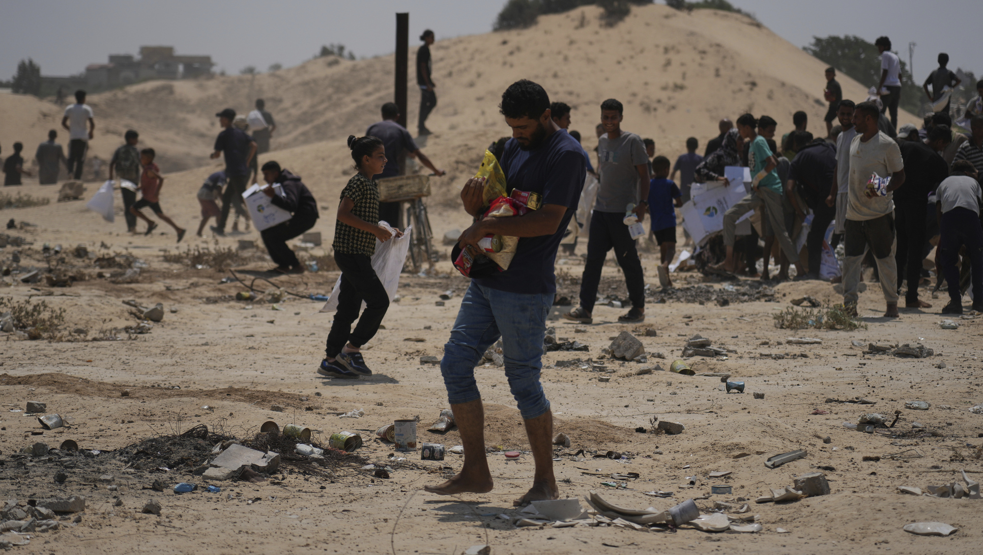 At least 26 killed seeking aid in Gaza as Netanyahu faces growing criticism