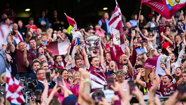 <p>Galway captain Carrie Dolan lifts the O'Duffy Cup. Pic: Ramsey Cardy/Sportsfile</p>