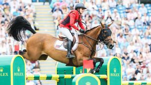 <p>UP AND OVER: USA’s Laura Kraut onboard Bisquetta. Pic: INPHO/Tom Maher</p>