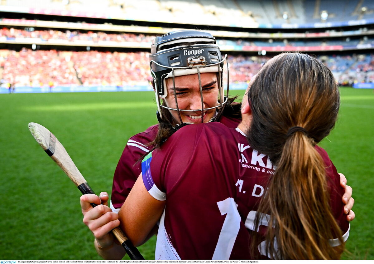 HOW SWEET IT IS: Galway players Carrie Dolan, behind, and Mairead Dillion celebrate after their side's victory in the Glen Dimplex All-Ireland Senior Camogie Championship final match between Cork and Galway at Croke Park in Dublin. Photo by Piaras Ó Mídheach/Sportsfile