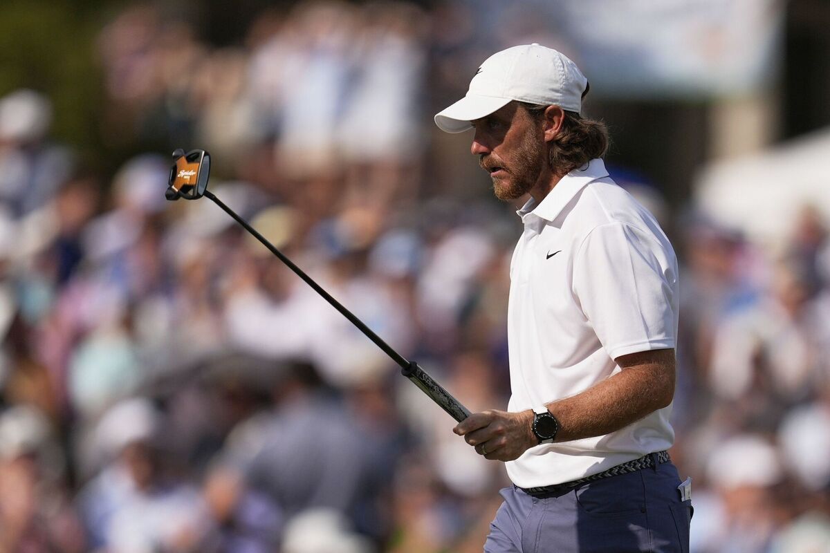 TOUGH STRETCH: Tommy Fleetwood, of England, walks on the 18th green during the final round of the St. Jude Championship golf tournament Sunday, Aug. 10, 2025, in Memphis, Tenn. (AP Photo/George Walker IV)