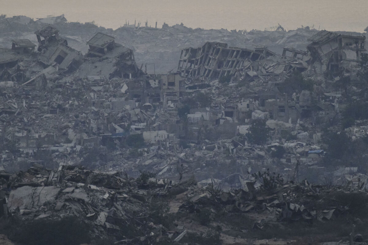 Buildings that were destroyed during the Israeli ground and air operations stand in the northern Gaza Strip as seen from southern Israel. Picture: AP Photo/Leo Correa Buildings that were destroyed during the Israeli ground and air operations stand in the northern Gaza Strip as seen from southern Israel. Picture: AP Photo/Leo Correa
