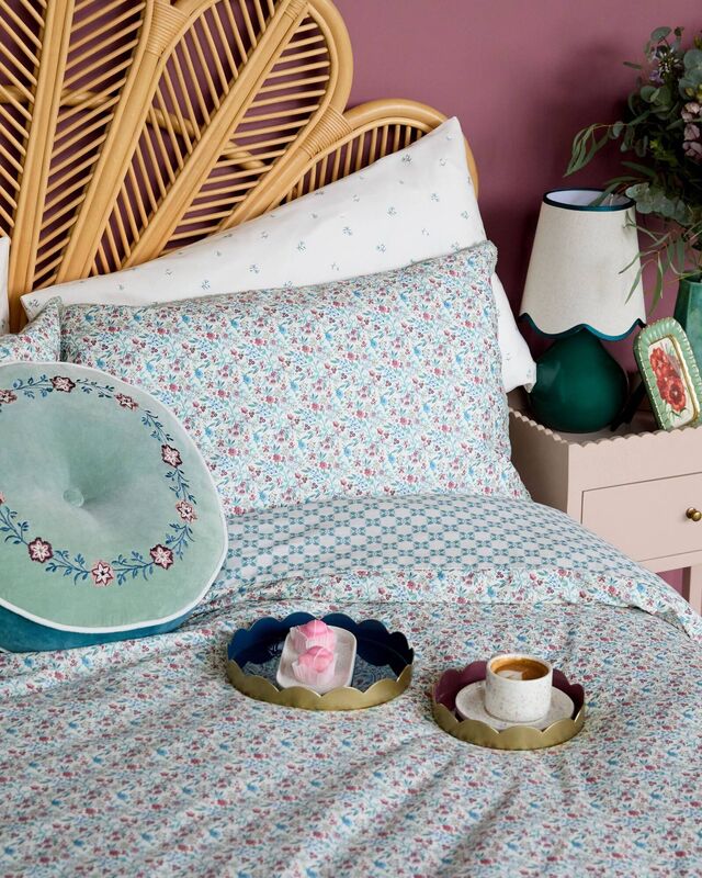 The Carolyn Donnelly Eclectic collection bed linens at Dunnes Stores in soft blue with tactile velvet cushions are a relaxing and inviting combination for winter hibernation.