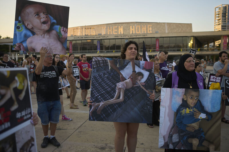 Israeli activists take part in a protest last month in Tel Aviv against the war in the Gaza Strip. Recent polls suggest that more than 70% of Israelis want the war to end now. File photo: AP/Ohad Zwigenberg
