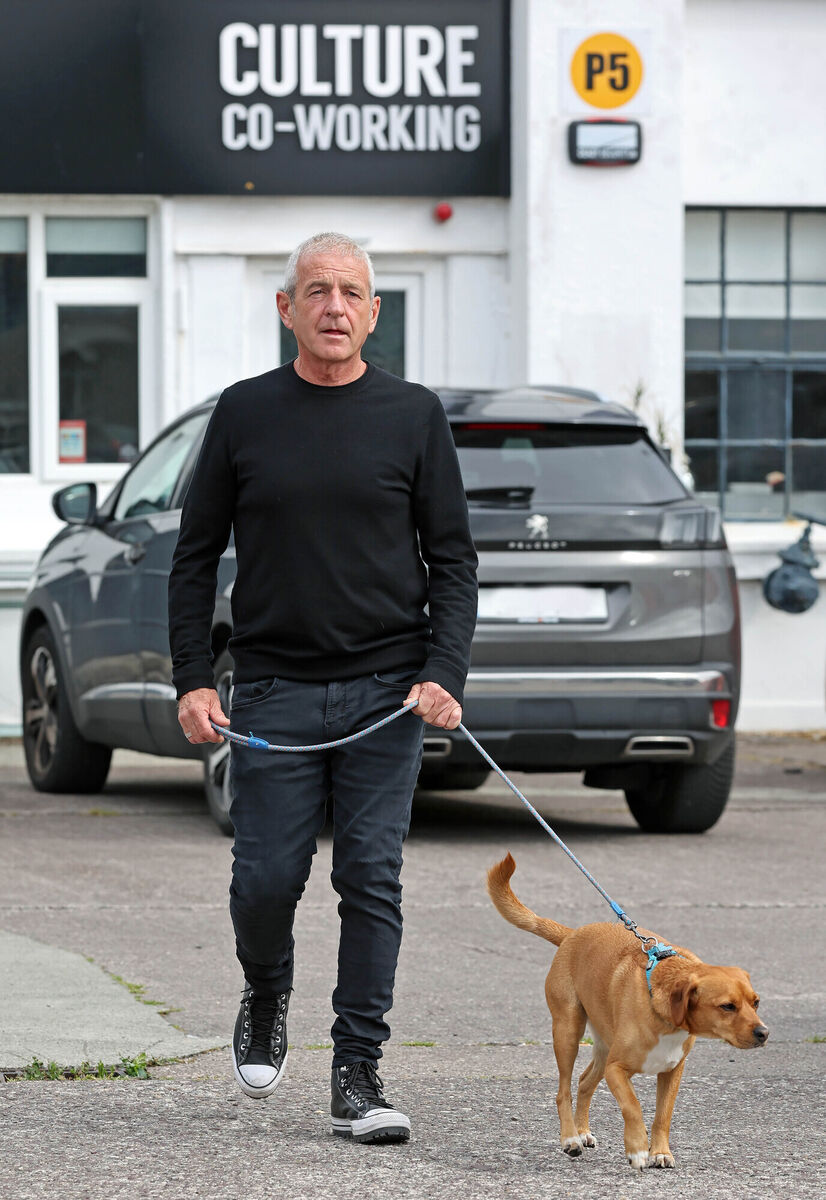 Stephen Neenan and his dog Duke, at Culture Co-Working. Picture: Jim Coughlan.