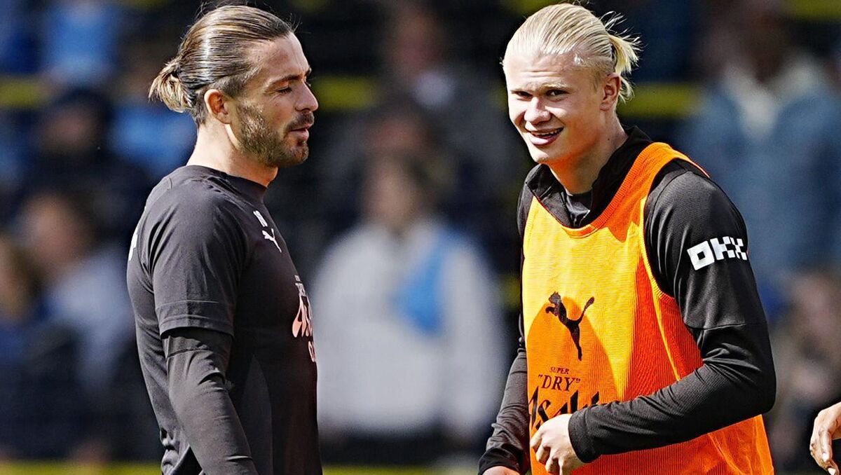 Manchester City's Jack Grealish (left) and Manchester City's Erling Haaland speak during training session at the City Football Academy, Manchester. Picture: Peter Byrne/PA Wire. Manchester City's Jack Grealish (left) and Manchester City's Erling Haaland speak during training session at the City Football Academy, Manchester. Picture: Peter Byrne/PA Wire.