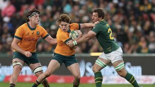 <p>ARE AUSTRALIA BACK: Australia's fly-half James O'Connor (C) is tackled by South Africa's lock forward Kwagga Smith (R) during the Rugby Championship first round. Pic: PHILL MAGAKOE/AFP via Getty Images</p>