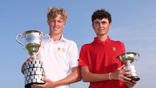 <p>Guus Lafeber of the Netherlands poses with the trophy alongside runner up Yago Horno of Spain during the Final of Matchplay at The R&amp;A Boys' Amateur Championship at County Louth Golf Club (Baltray). Picture: Oisin Keniry/R&amp;A</p>