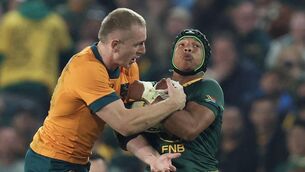 <p>TUSSLE: Australia's impressive winger Max Jorgensen contests possession with South Africa's Kurt-Lee Arendse at Ellis Park Stadium in Johannesburg Pic: Phill Magakoe/AFP </p>