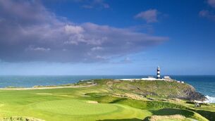 <p>GOLF'S X-FACTOR: Old Head's classic finishing hole from behind the green and looking out towards the famous lighthouse. Kevin Markham article</p>