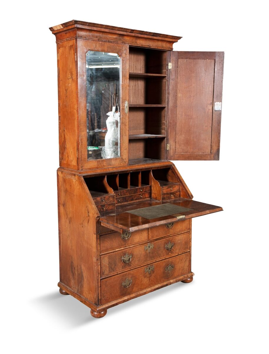 A c1730 bureau bookcase at James Adam.