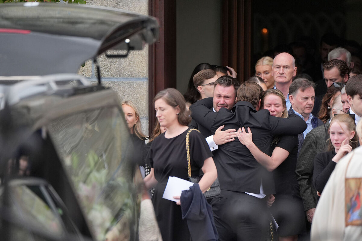 Mourners embrace following the funeral of Martha Nolan O'Slatarra at the Cathedral of the Assumption, Carlow. Picture: Niall Carson/PA Wire