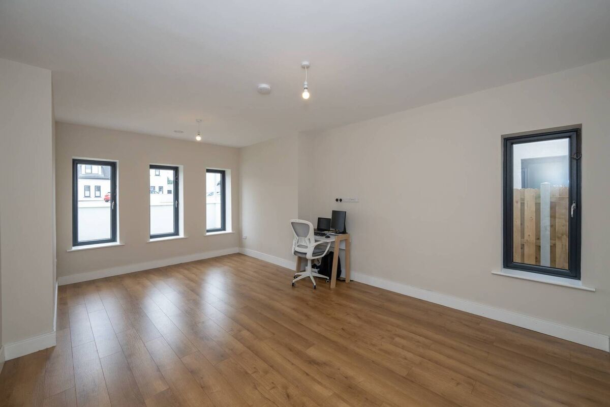 Trio of windows in the front sitting room