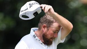 <p>FEELING THE HEAT: Shane Lowry  on the second green during the first round of the Tour Championship at East Lake Golf Club. Picture: Kevin C Cox/Getty Images</p>