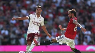 <p>CONTROL: Arsenal's Martin Zubimendi beats Bruno Fernandes to the ball in his Premier League debut for the Gunners last Sunday at Old Trafford. Pic: Stu Forster/Getty Images</p>