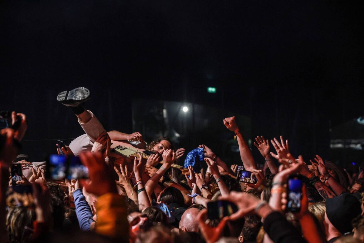 Lee Kiernan of IDLES crowdsurfing mid performance at Electric Picnic Festival 2023 at Stradbally Estate. Lee Kiernan of IDLES crowdsurfing mid performance at Electric Picnic Festival 2023 at Stradbally Estate.