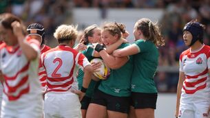 <p>Ireland's Enya Breen (centre) is congratulated by her team mates after scoring her sides sixth try. Picture: Joe Giddens/PA</p>