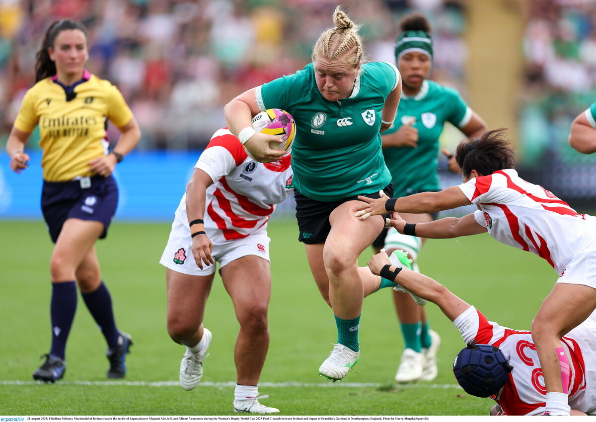 24 August 2025; Cliodhna Moloney MacDonald evades the tackle of Japan players Megumi Abe, left, and Minori Yamamoto. Picture: Harry Murphy/Sportsfile