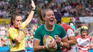 <p>Ireland's Fiona Tuite scores her side's fourth try of the match against Japan. Pic: ©INPHO/Ben Brady</p>