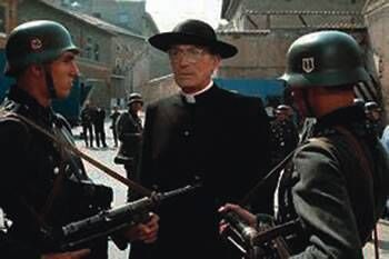 Gregory Peck in the lead role as Monsignor Hugh O’Flaherty in a scene from 'The Scarlet and The Black'. 