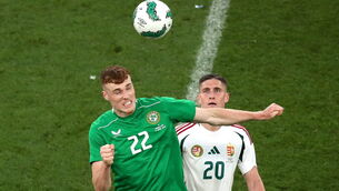 <p>4 June 2024; Jake O'Brien of Republic of Ireland in action against Roland Sallai of Hungary. Pic: Michael P Ryan/Sportsfile</p>