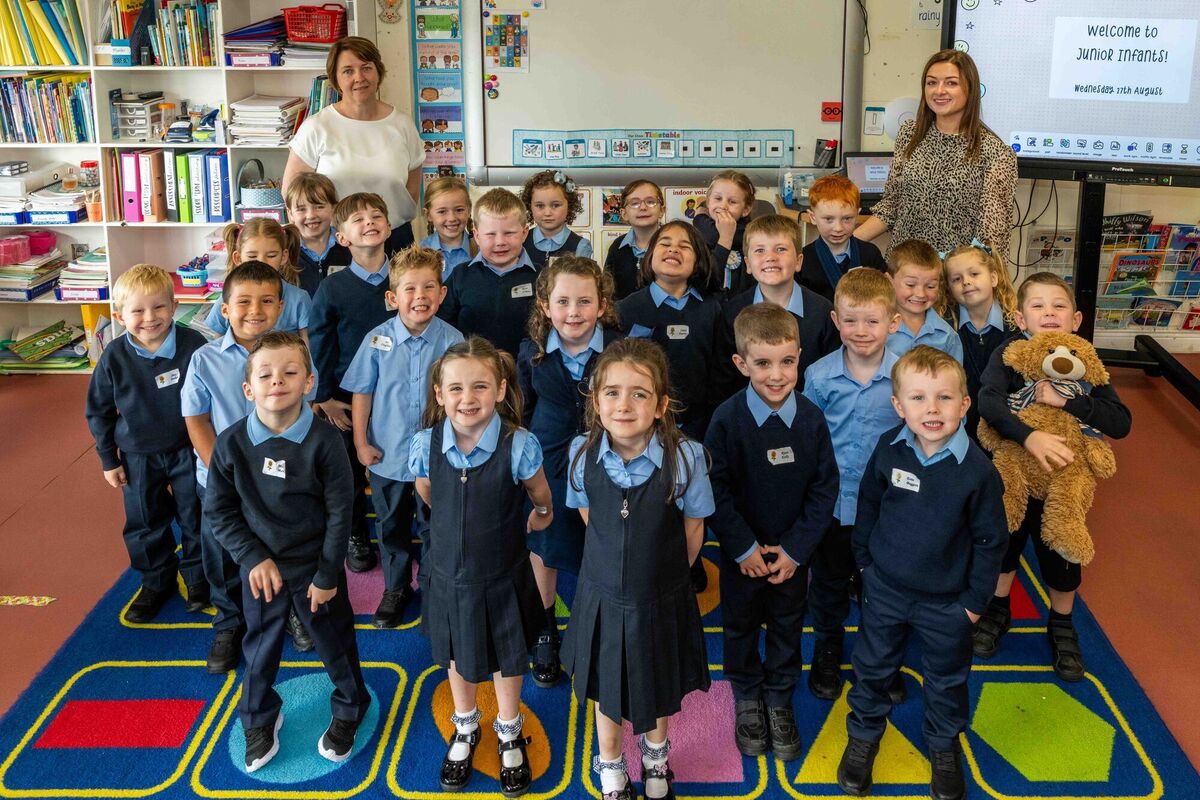 New students enjoying their first day at St Mary's Central School, Enniskeane, Co Cork, with teaching assistant Noreen O'Sullivan and teacher Sarah Jane Cronin. Picture: Andy Gibson