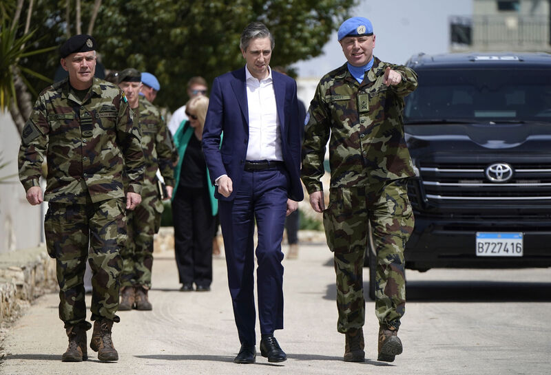 Tánaiste and defence minister Simon Harris on a visit to Camp Shamrock near the Israel-Lebanon border with then chief of staff Lt General Sean Clancy (left) and battalion commander Lt col Shane Rockett (right) earlier this year. Picture: Niall Carson/PA
