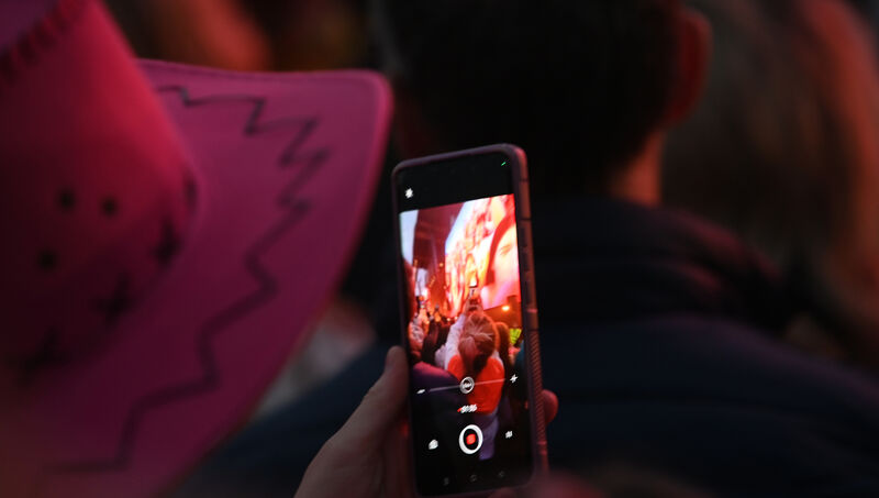  A fan records the performance of Chappell Roan performing on the main stage at Electric Picnic on Friday. Picture: Larry Cummins