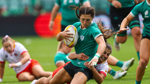 <p>Ireland's Amee-Leigh Costigan is tackled by Spain's Anne Fernandez de Corres. Pic: Ben Brady, Inpho</p>