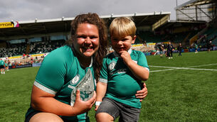 <p>WHIRLWIND: Ireland's Ellena Perry celebrates with her Player of the Match award and her son Bert after the game. Pic:  ©INPHO/Ben Brady</p>