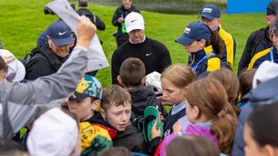 <p>FAN FAVOURITE: Rory McIlroy signs autographs for fans. Pic: ©INPHO/Morgan Treacy.</p>