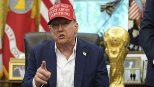 <p>President Donald Trump speaks alongside the FIFA World Cup Winners Trophy in the Oval Office of the White House, Friday, Aug. 22, 2025, in Washington. (AP Photo/Jacquelyn Martin)</p>