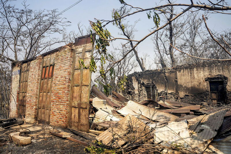 Walls stand at a building destroyed by the TCU September Lightning Complex fire. Picture: Noah Berger/AP Walls stand at a building destroyed by the TCU September Lightning Complex fire. Picture: Noah Berger/AP
