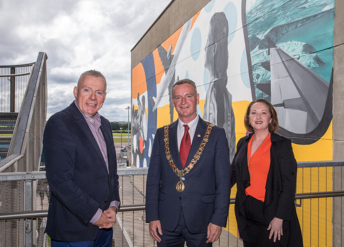 Lord Mayor of Cork, Cllr. Fergal Dennehy with Cork Airport Managing Director, Neil MacCarthy and Lady Mayoress Karen Brennan at the unveiling of a mural. Picture: David Creedon