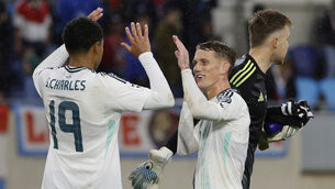<p>Northern Ireland’s Ethan Galbraith, right, celebrates with team-mate Shea Charles. Pic: Geert Vanden Wijngaert/AP</p>
