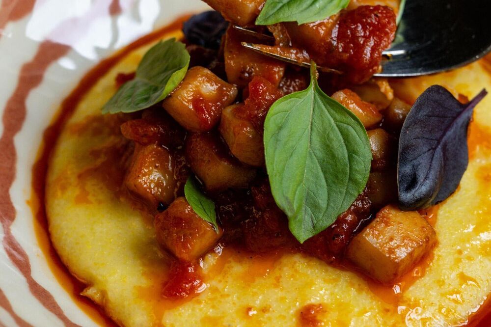 Squid ragu with creamy polenta