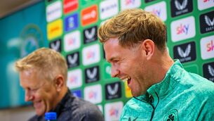 <p>Manager Heimir Hallgrímsson and Nathan Collins laugh together at the press conference. Pic: Ryan Byrne/Inpho</p>