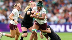 <p>Grace Moore of Ireland is tackled by Jorja Miller, left, and Risi Pouri-Lane of New Zealand. Photo by Harry Murphy/Sportsfile</p>