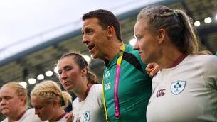 <p>Ireland's Head Coach Scott Bemand speaks to Ireland players after the match. Pic: ©INPHO/Ben Brady.</p>